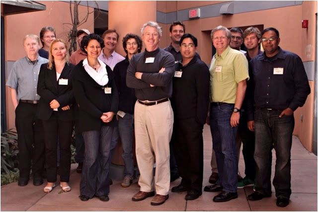 Photograph of Bob Kirshner's 60th birthday party, a group of students and postdocs who worked with him at some point.