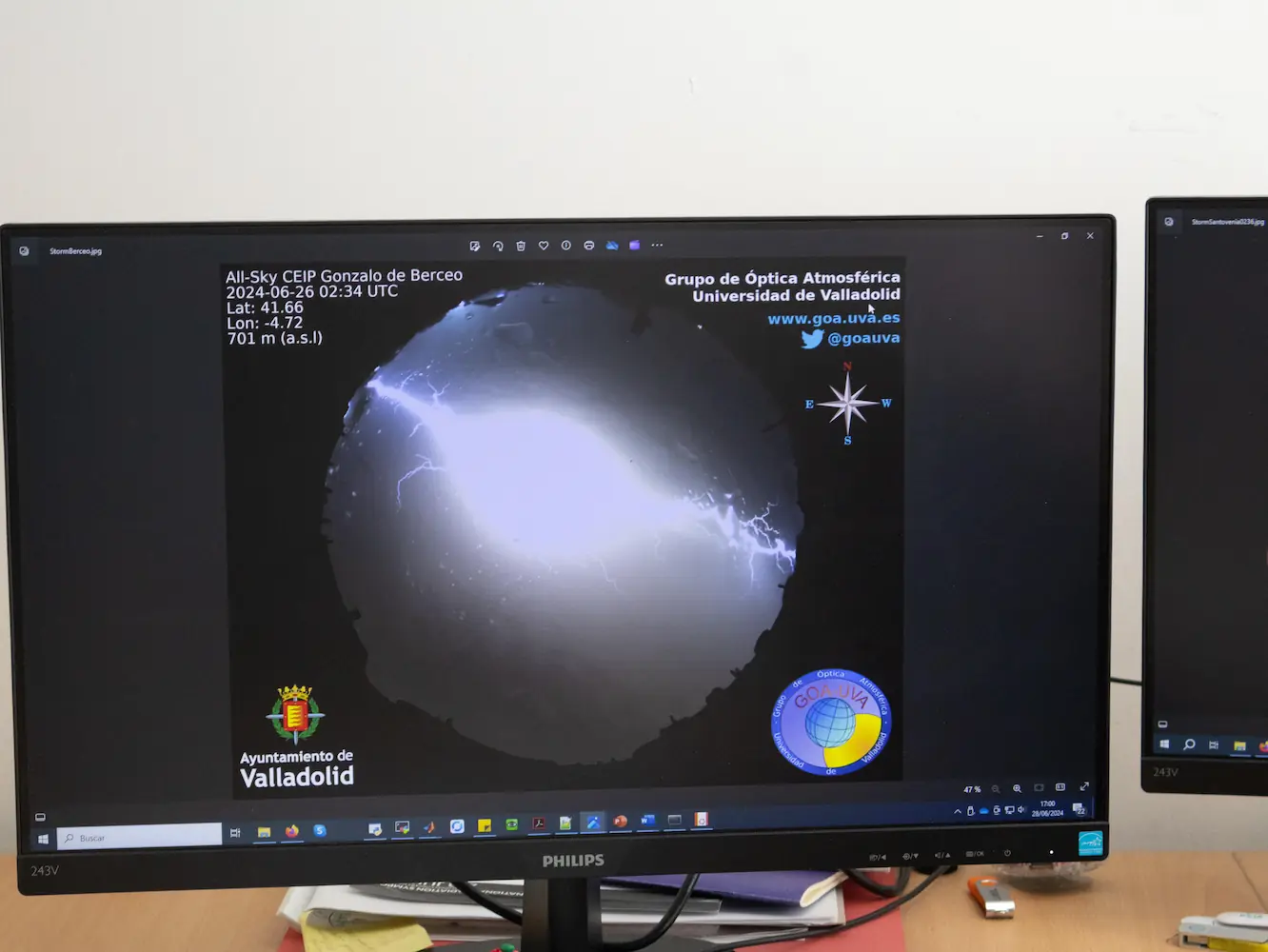 Photo of what is seen through a sky camera with a lightning strike.